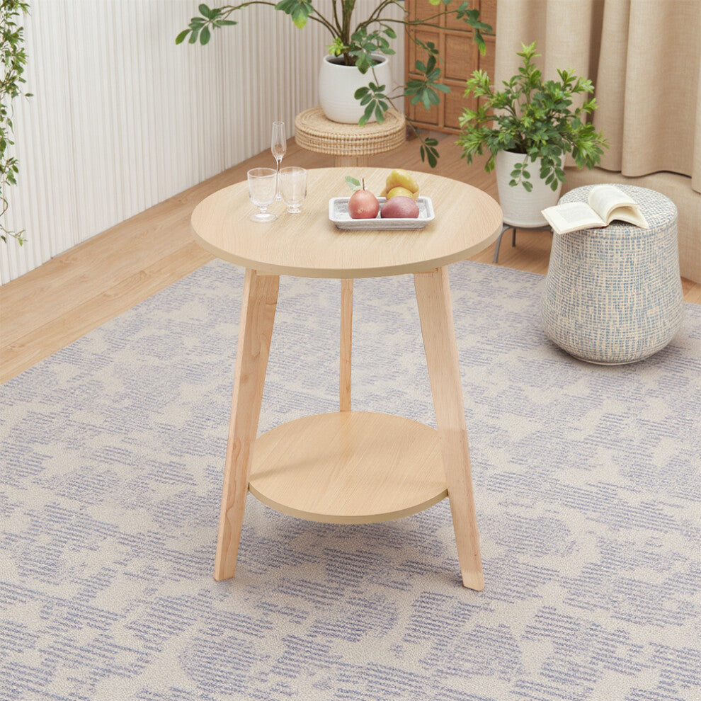 2 tier round side table in natural wood with glasses and a fruit tray on top and a lower shelf, styled on a patterned rug