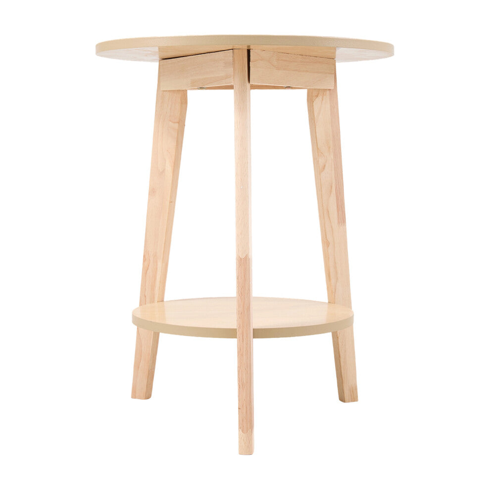 Light wood 2 tier round side table with three splayed solid wood legs on a white background