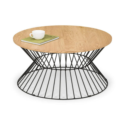 80cm round oak-effect coffee table on a black metal wire base with cup and book