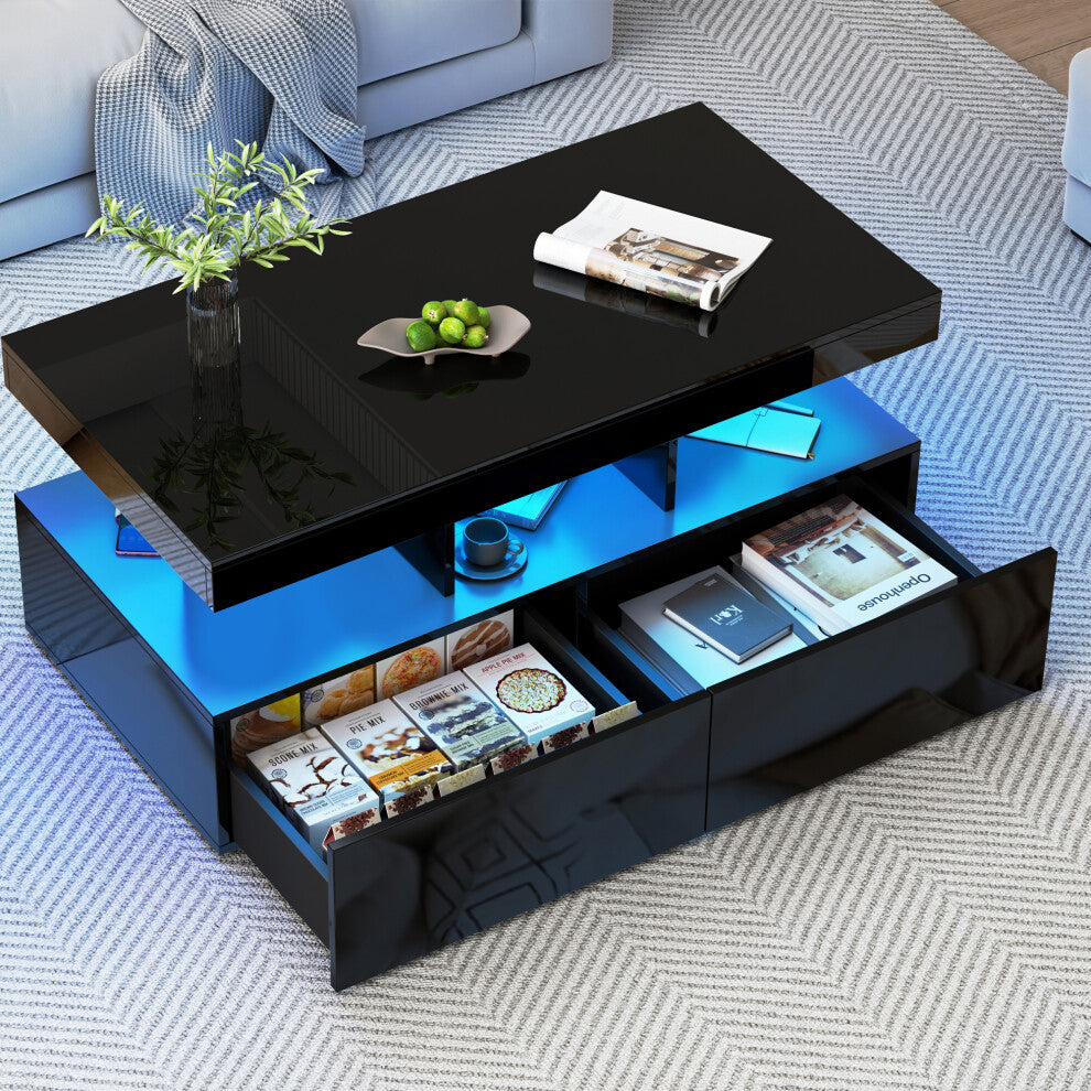Black coffee table with storage showing both drawers open and blue LED lighting