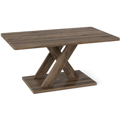 Brown rectangular coffee table with X-shaped wooden-look pedestal on a white background