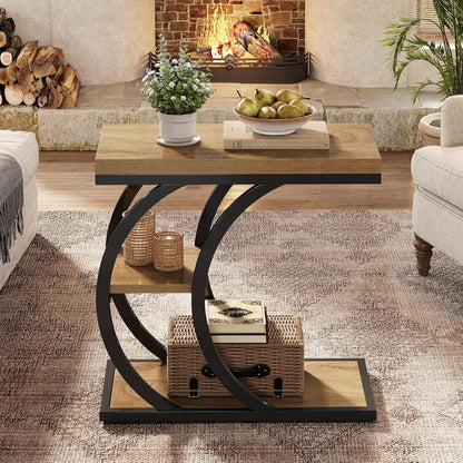 Couch side table with three tiers in a living room with a basket and books on the lower tray