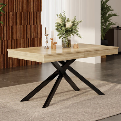 Extendable dining table 180cm with oak-effect top and black cross legs styled with eucalyptus and candle holders
