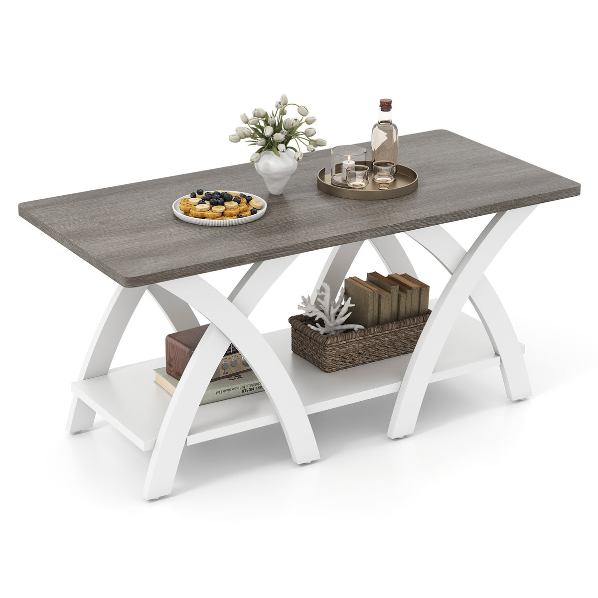 Grey top white legs coffee table styled with plant, tray and baskets on the lower shelf