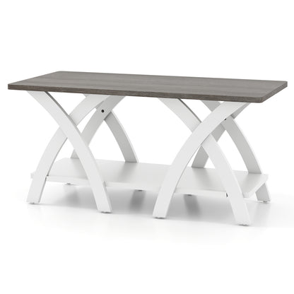 Rectangular grey and white coffee table with arched X-shaped legs on a plain white background