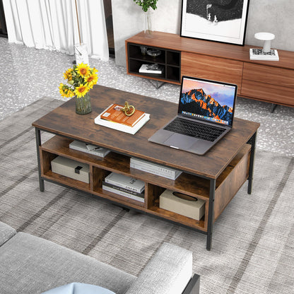 Large coffee table with storage seen from above with laptop, sunflowers and books