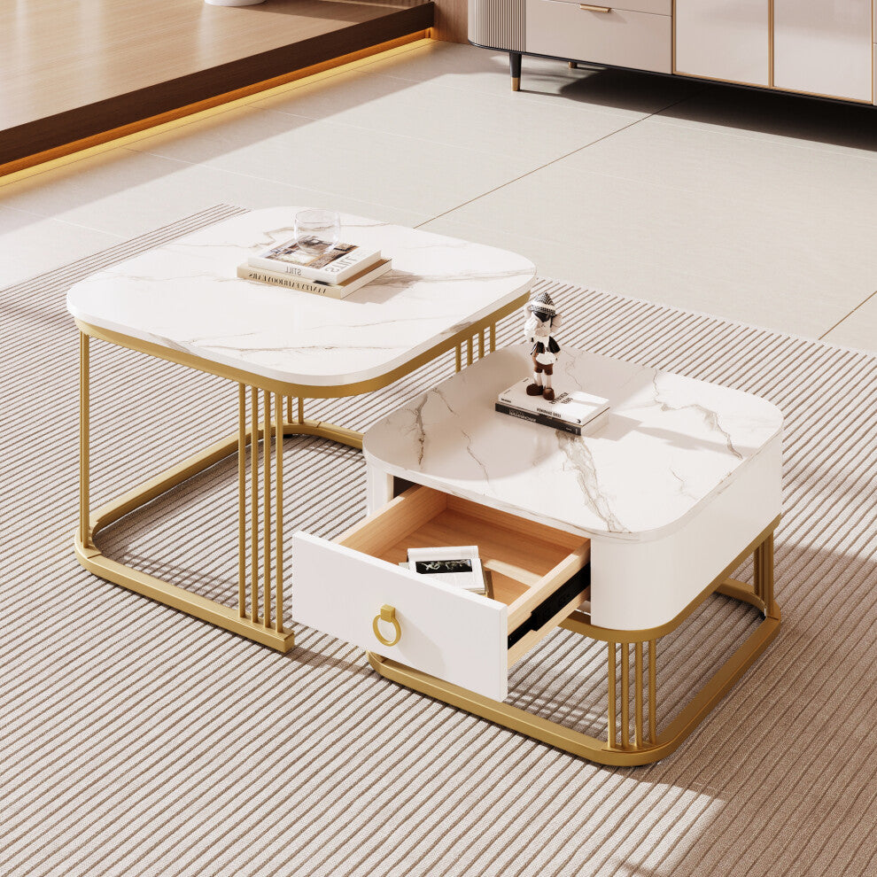 Marble gold coffee table nesting set of 2 with white faux marble tops on a striped rug in a living room