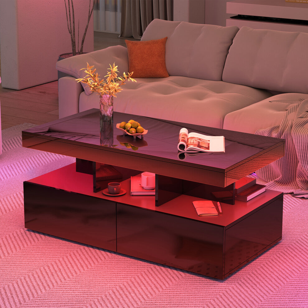 Modern coffee table with storage in black gloss with red LED lighting in a living room