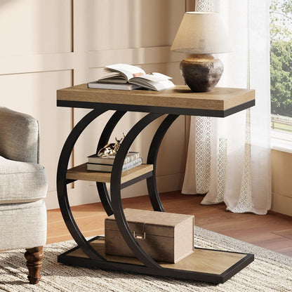 Narrow sofa side table in a reading corner with a lamp, books and a storage box