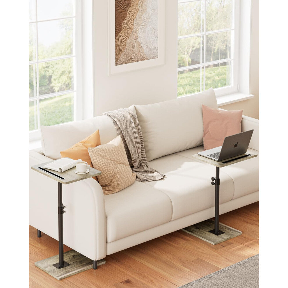 Pair of small grey wood coffee tables either side of a sofa in a living room