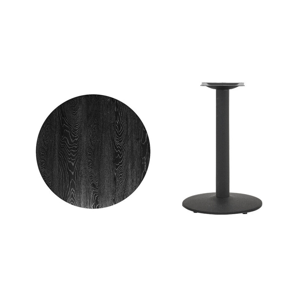Round black wood-grain tabletop shown beside its black metal pedestal base with mounting bracket