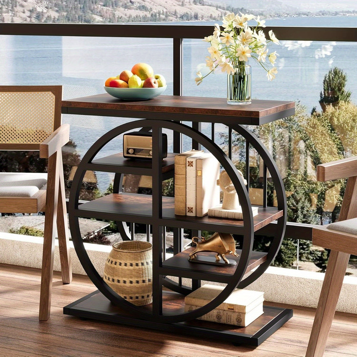 Narrow side table with shelves between two armchairs near a bright window