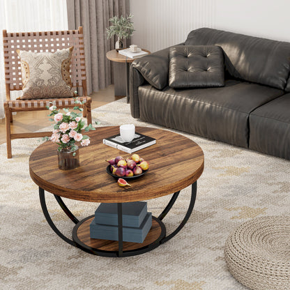 Round wooden coffee table with black frame styled with a dark leather sofa