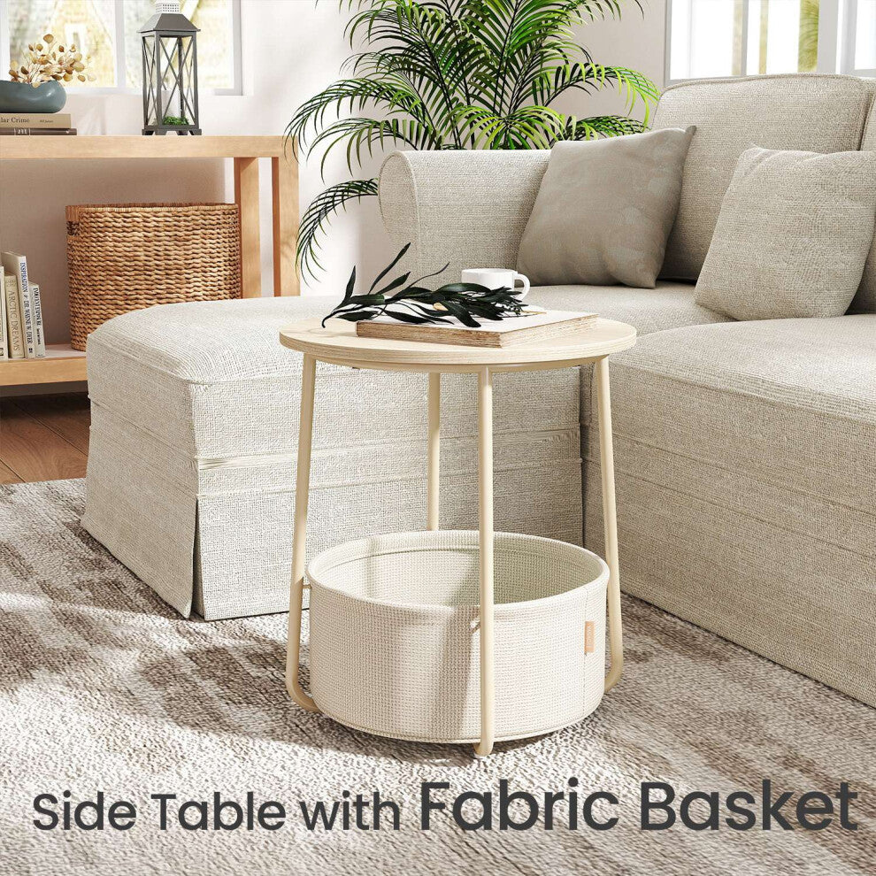 Small coffee table with storage, round light wood effect top and removable fabric basket beside a linen sofa