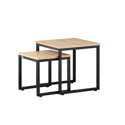 Small square nest of 2 tables with light oak-effect tops and black metal frames on a white background