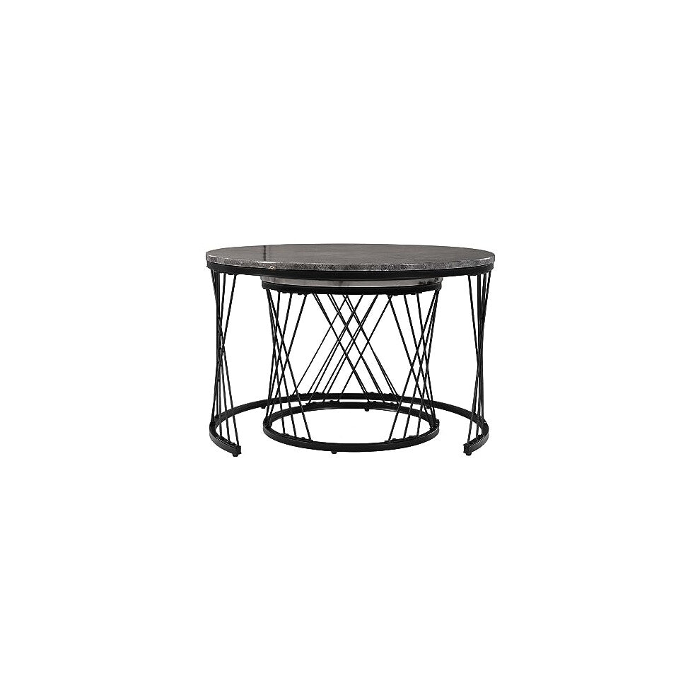 Small white round table nested inside larger grey marble-effect coffee table frame