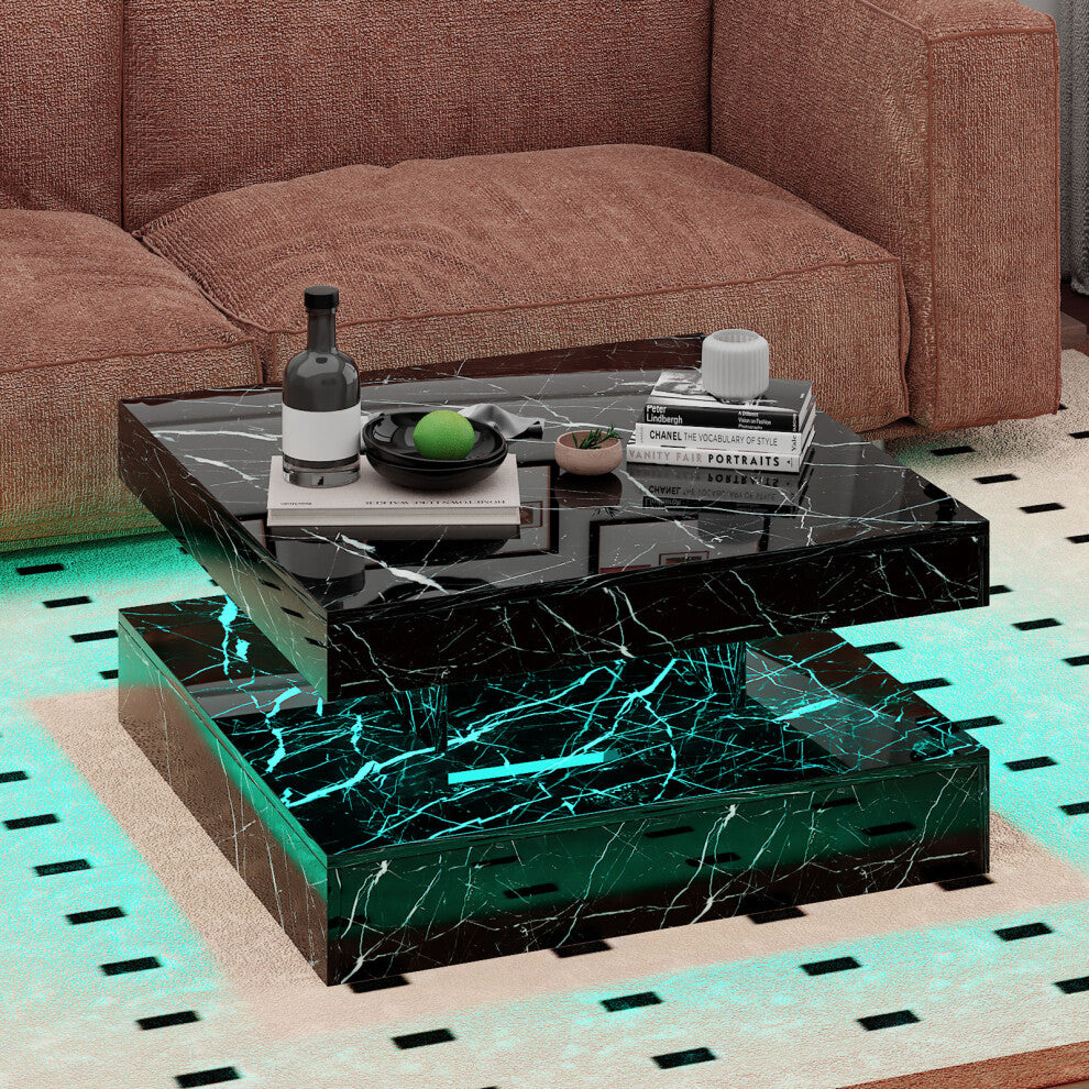 Square marble coffee table with LED lights, black marble effect two tiers and turquoise glow in front of a terracotta sofa