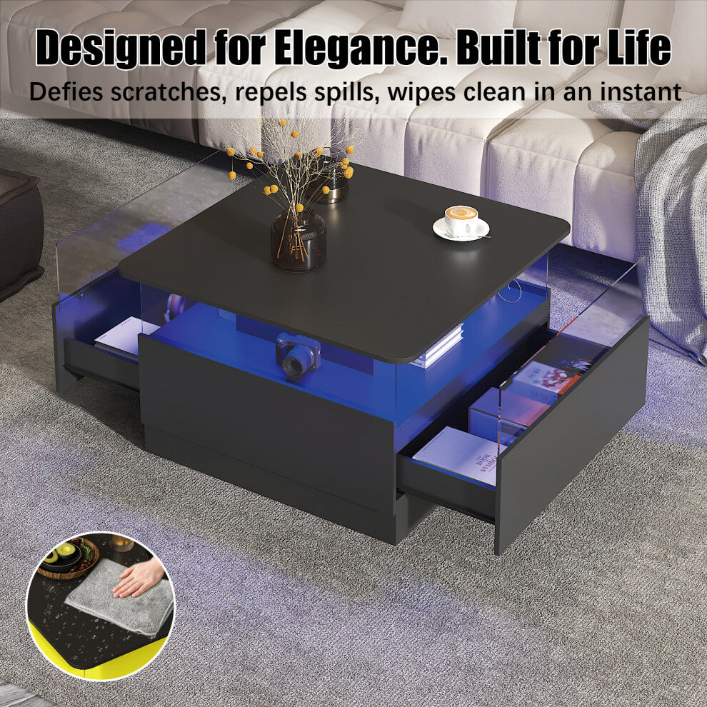 Square storage coffee table with blue LED lighting and drawers open, showing the wipe-clean black top