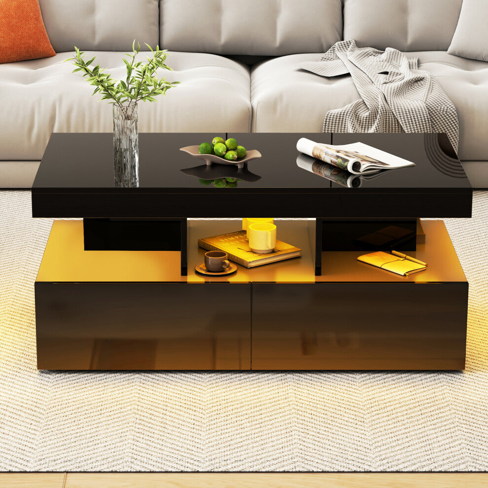 Black high gloss storage coffee table with amber LED display shelf in front of a cream sofa