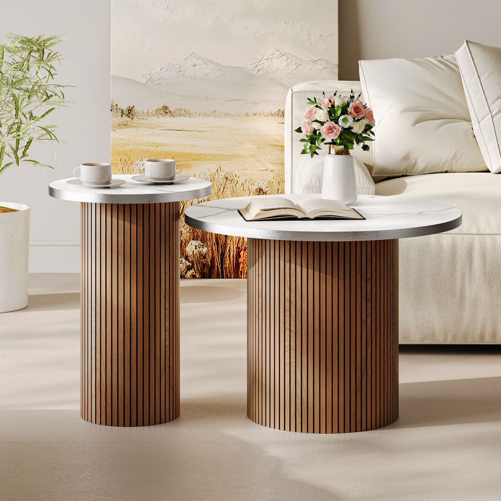 Walnut fluted round pedestal coffee table set styled with roses and coffee cups