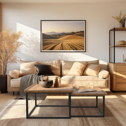 Walnut square nesting coffee tables staggered in front of a cream sofa in a sunlit living room