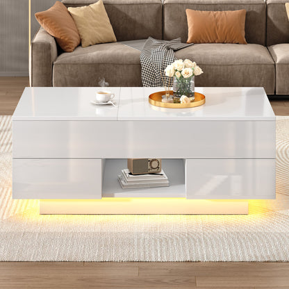 White high gloss coffee table with drawers, open cubby and warm LED plinth in front of a taupe sofa