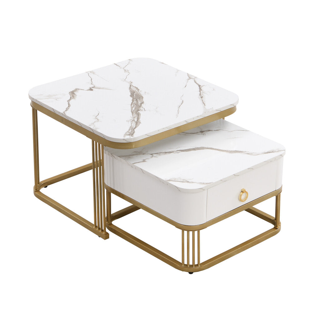 White faux marble nesting coffee table set with gold-tone frames and closed drawer