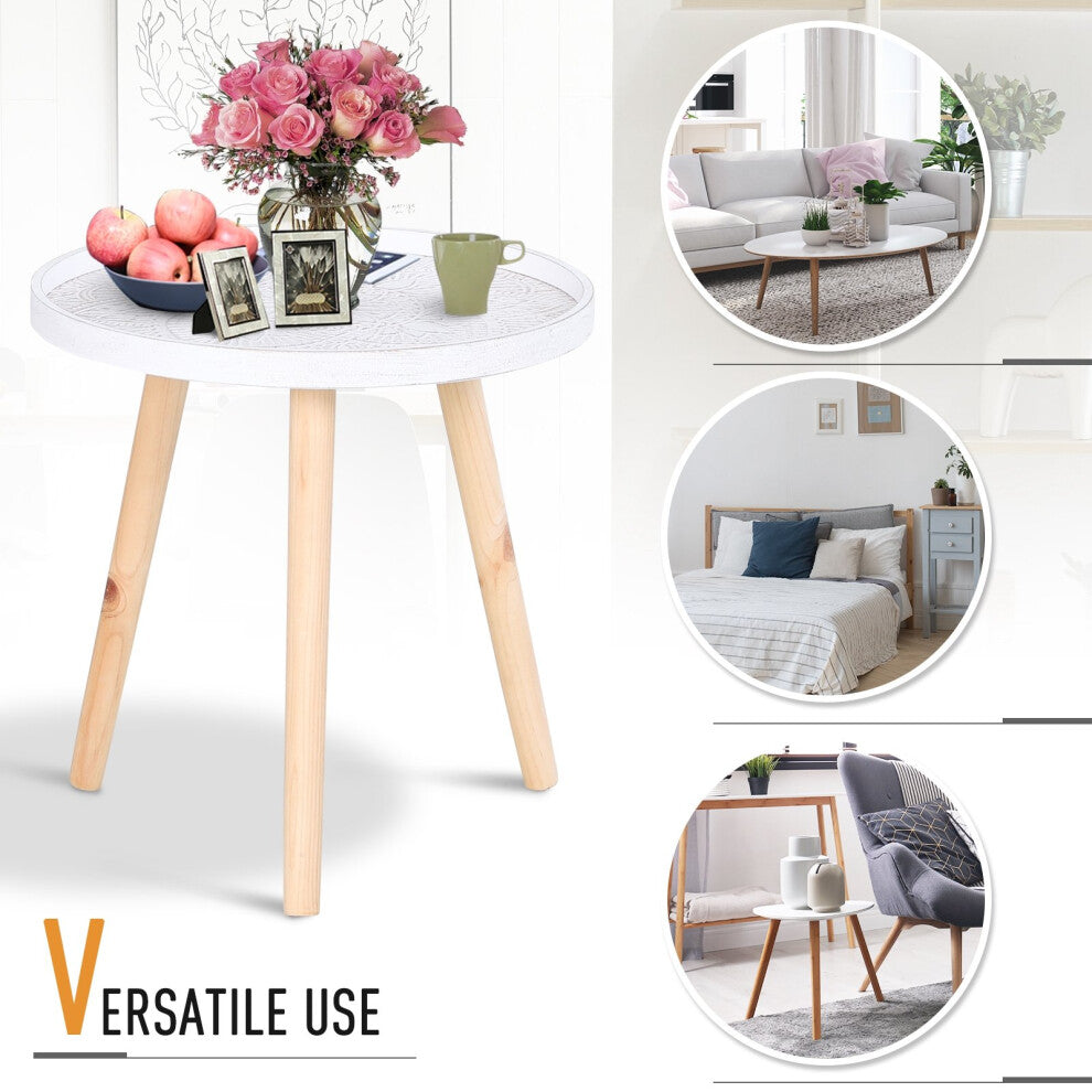 White mandala round side table styled with roses, fruit and photo frames for versatile use in living room or bedroom
