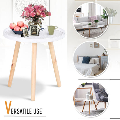White mandala round side table styled with roses, fruit and photo frames for versatile use in living room or bedroom