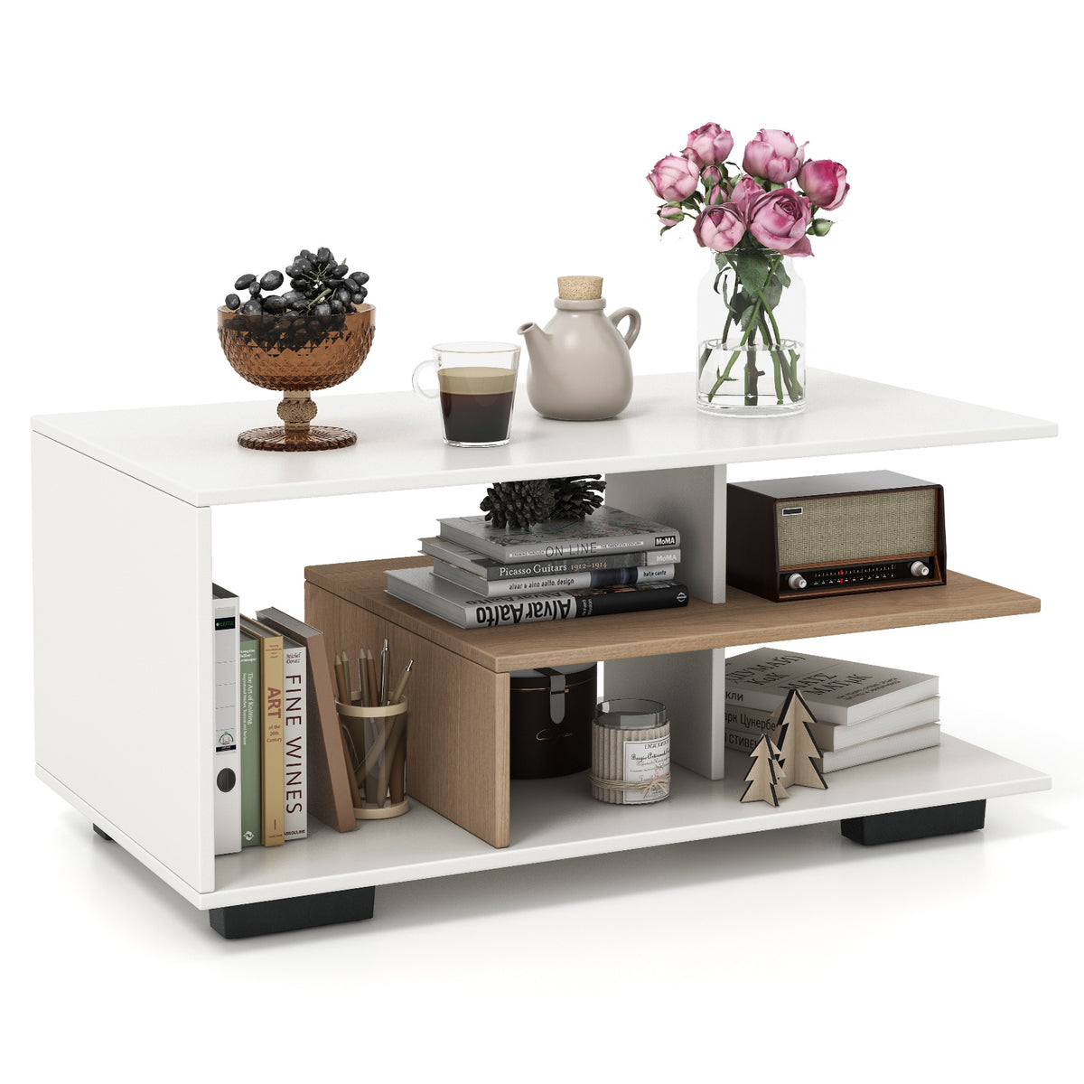 Rectangular white open-shelf coffee table with flowers, tea set, books and radio on shelves