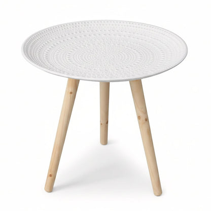 White round tray table with textured dot top and three natural pine-look legs on a white background