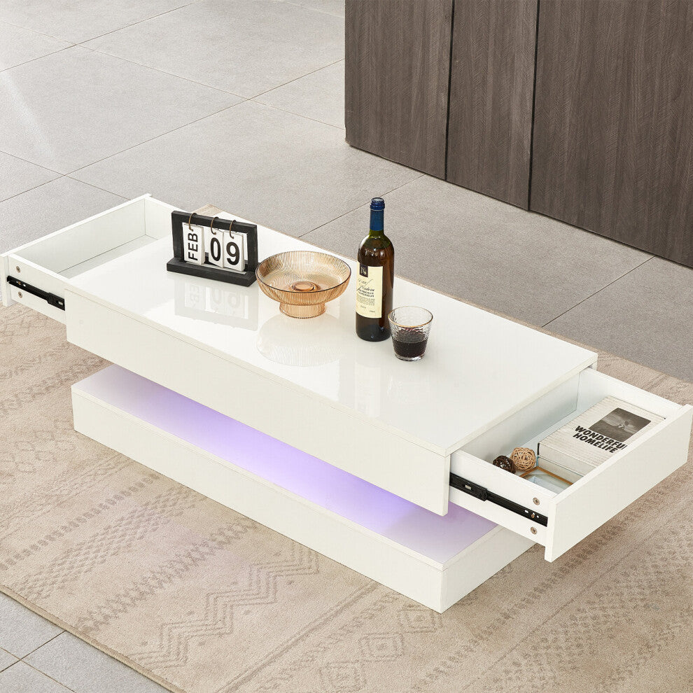 White storage coffee table with drawers open at both ends and violet LED light